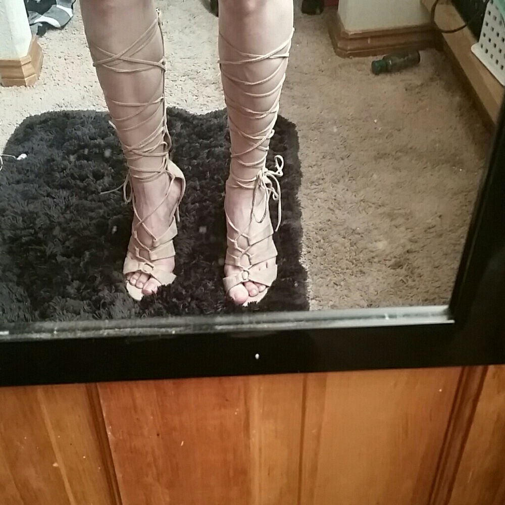 Knee high stringy heels